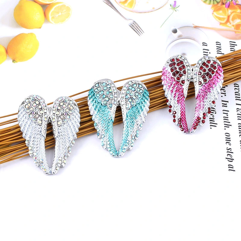 Angel wings brooch