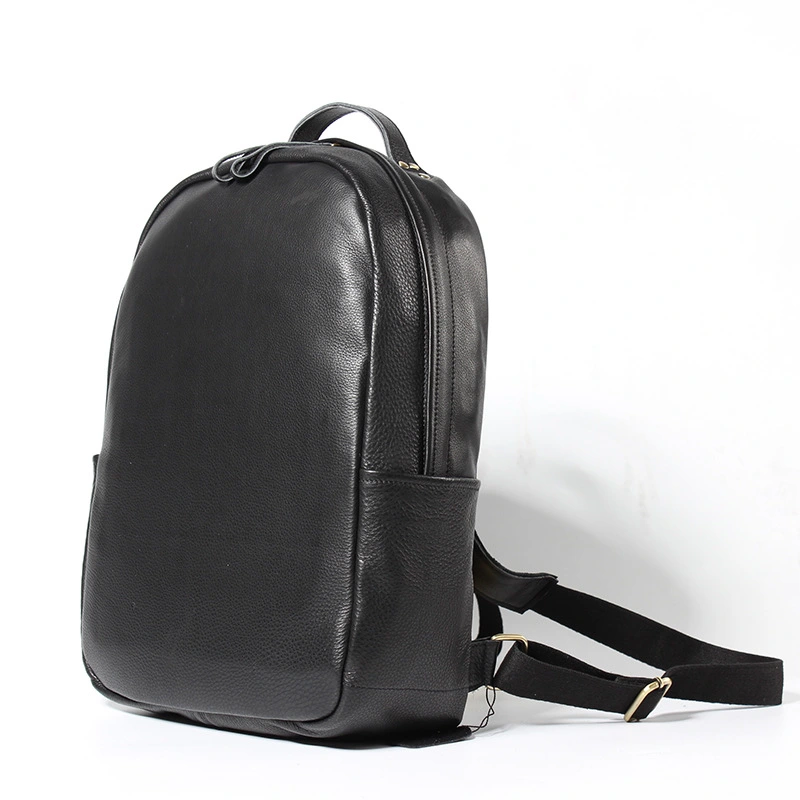 The factory sells leather double shoulders, Baotou layer cowhide, European and American men's backpack, high grade travel and leisure men's bags wholesale