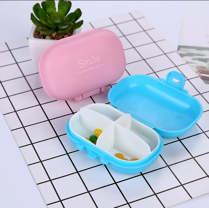 Macarons small pill box Japanese plastic pill box portable portable mini sub-four compartment storage box pill box