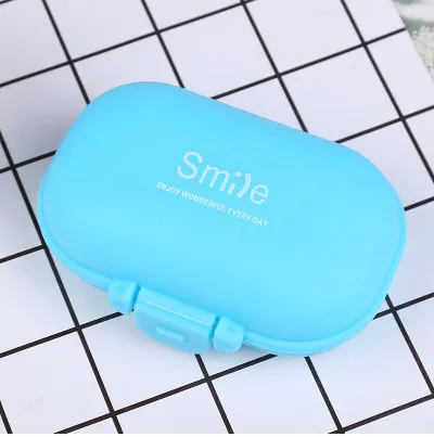 Macarons small pill box Japanese plastic pill box portable portable mini sub-four compartment storage box pill box