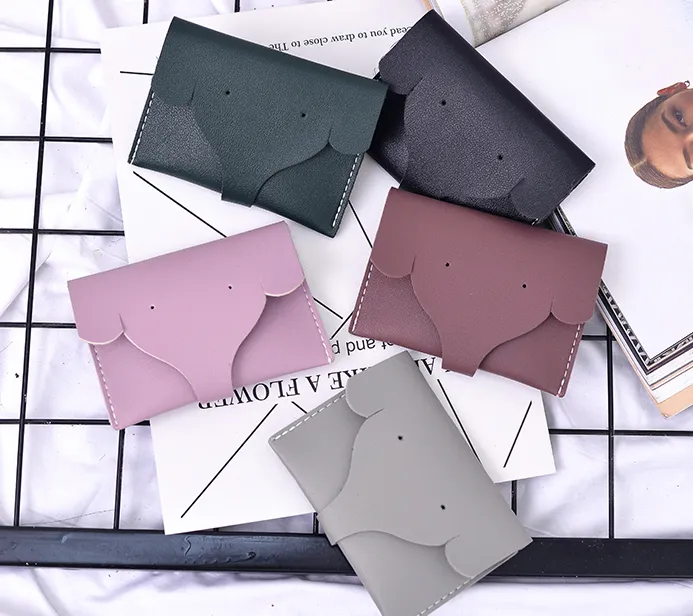 New tri-fold PU ladies wallet simple solid color short elephant nose Korean version of the coin purse