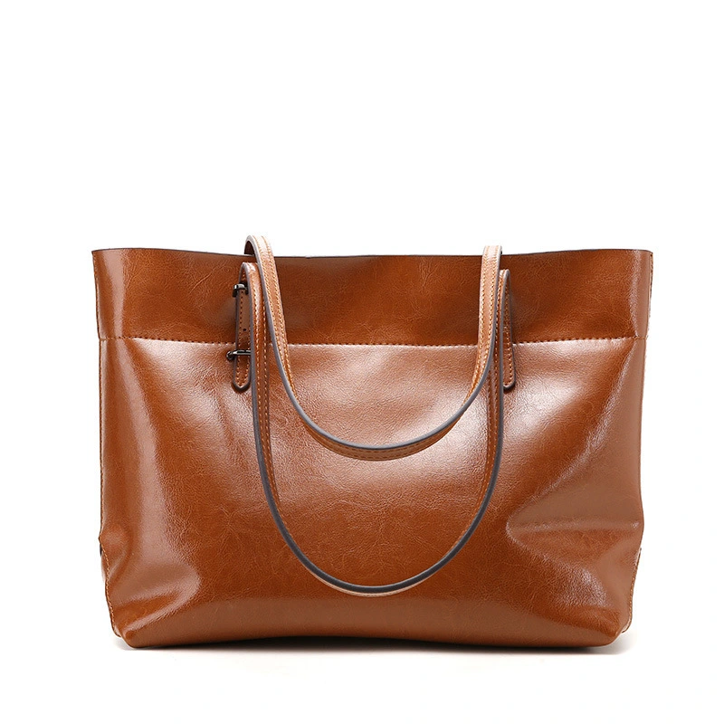 New fashion leather handbag shoulder cowhide shopping bag leather bag is simple and practical, portable