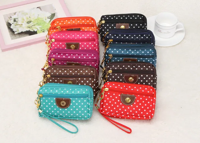 Canvas handbags handbags Korean version of the three-zipper multi-layer wallet hand bag packet phone change