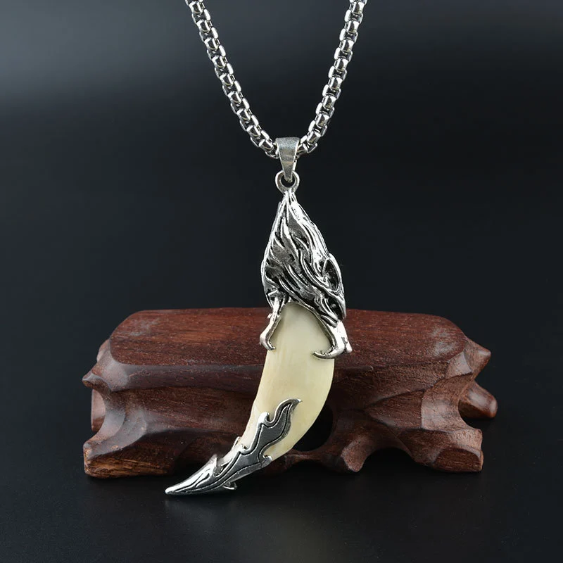 Wolf tooth pendant really black dog tooth