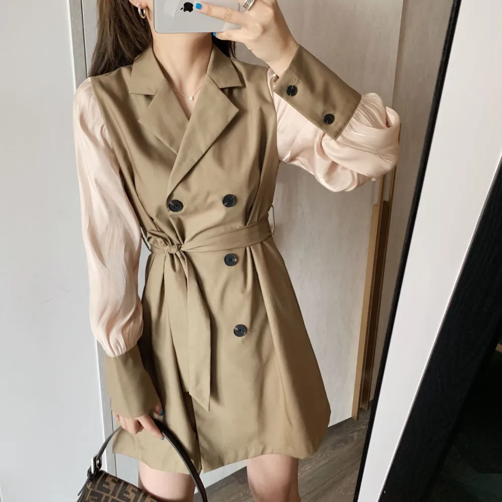 A windbreaker dress with collared sleeves