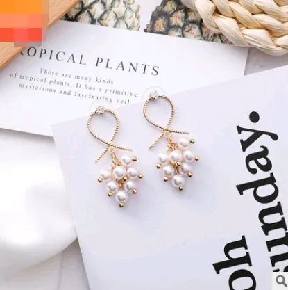 Personality wild pearl grape beaded earrings cold wind hollow line cross geometry earrings female