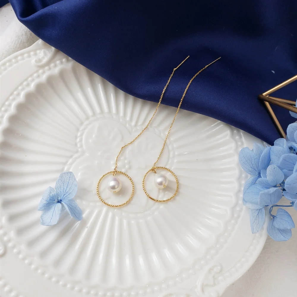 Drop-shaped pearl earrings