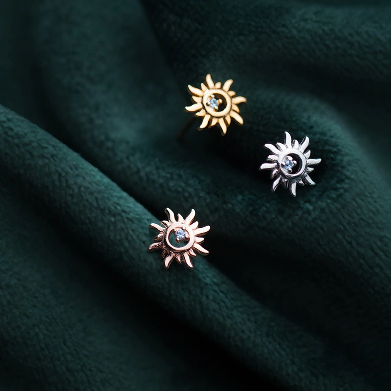 Hollow sun earrings