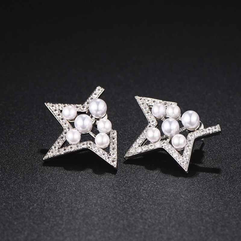 Female Pearl Star Stud Earrings