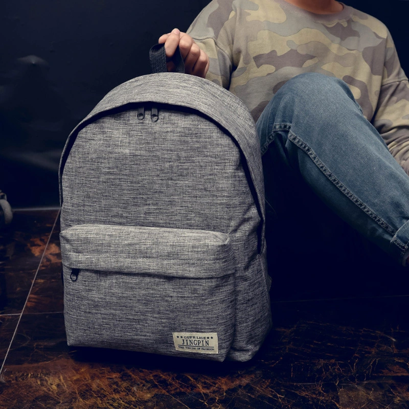 Pure color Canvas Backpack, female middle school student bag, Korean style small tidecollege wind backpack male fashion travel bag