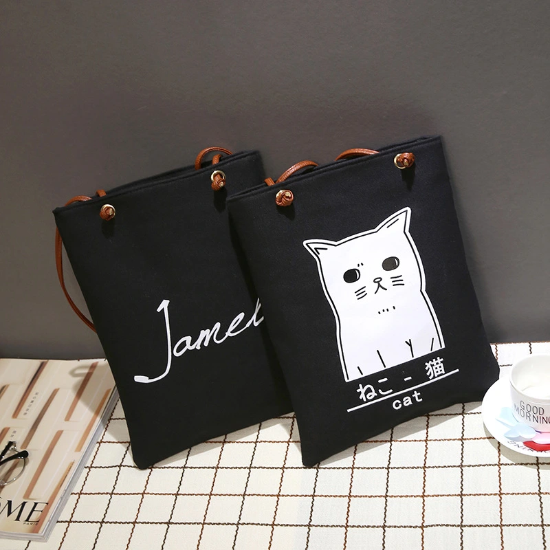 The new Korean alphabet printed Canvas Handbag Shoulder canvas bag student bag female canvas bag cloth female fashion tide