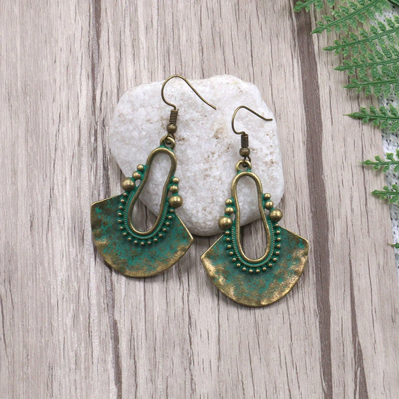 Hollow fan-shaped alloy earrings