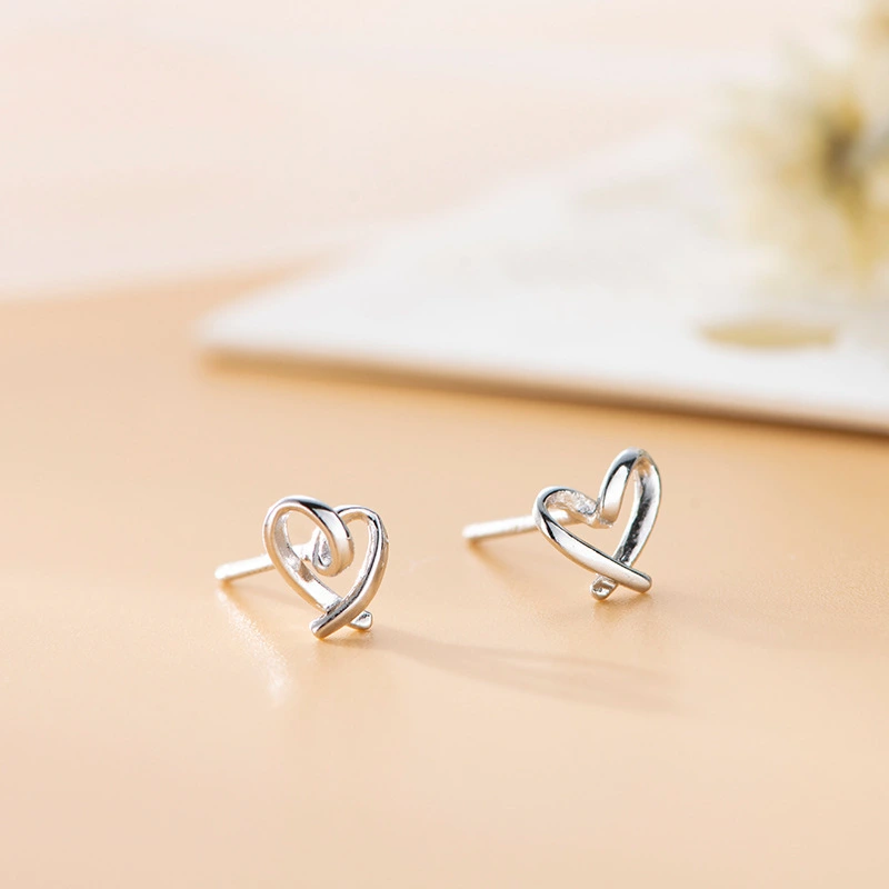 Heart-shaped earrings female sweet mini hollow love earrings