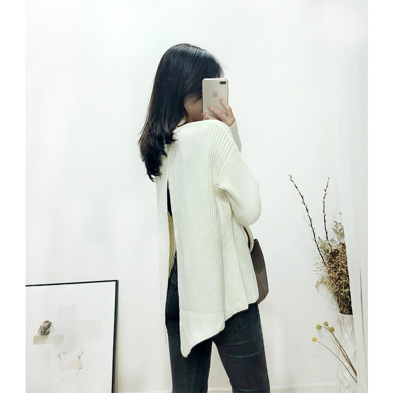 Loose slit sweater