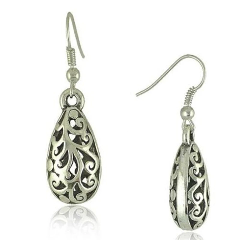 Openwork carved earrings