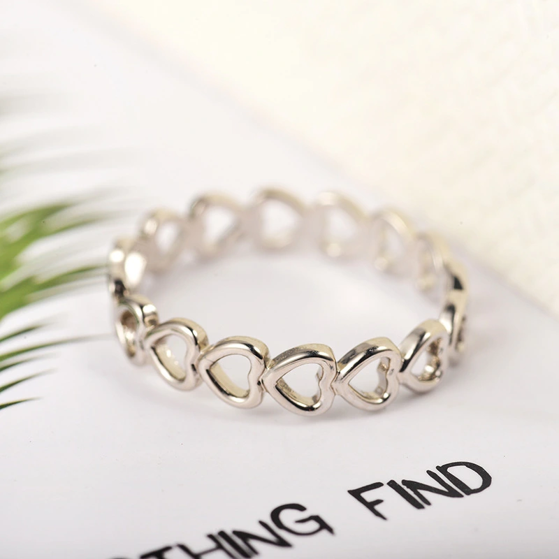 The New Metal Copper Ring Adjustable Women's Hollow Love Ring