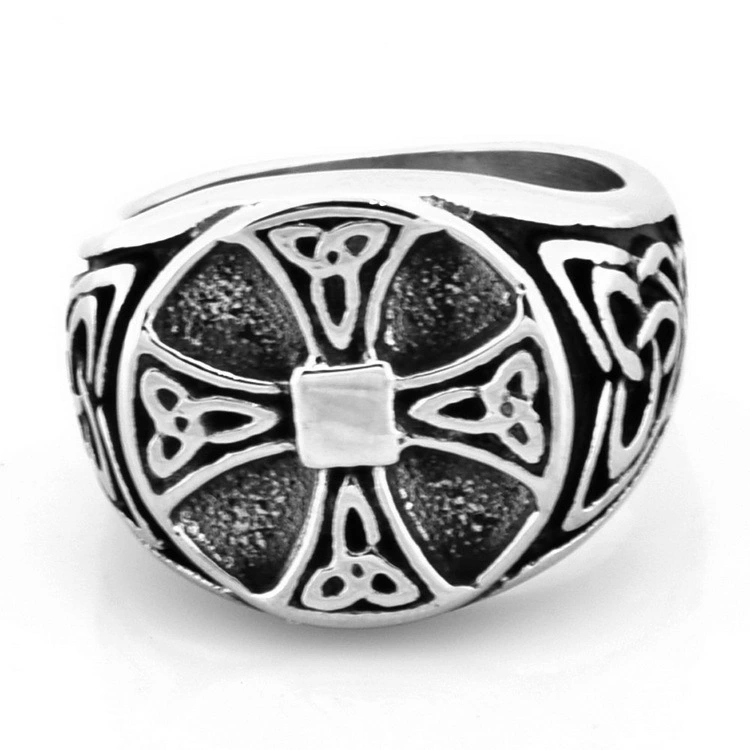 Cross pattern carved ring