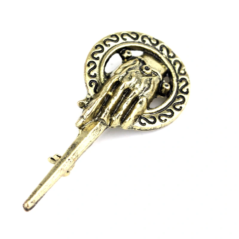 King's hand brooch