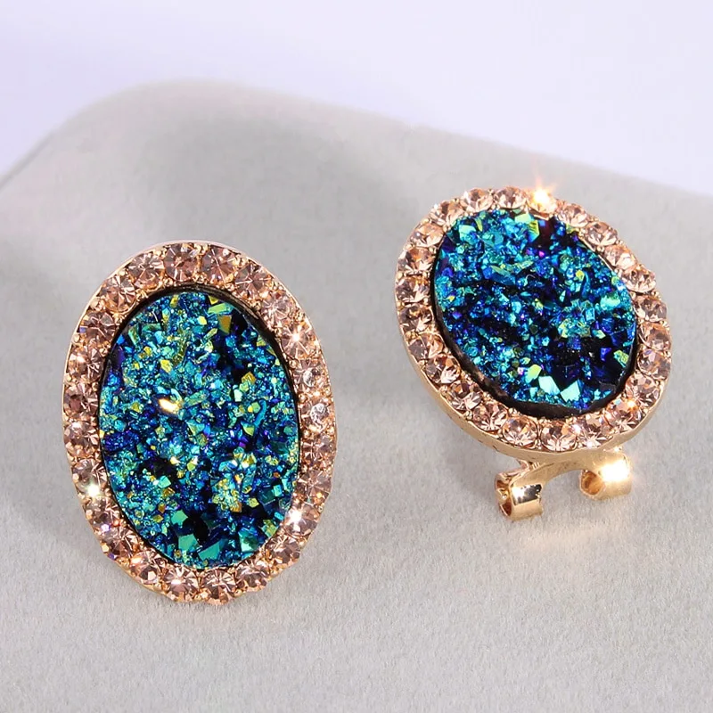 Blue oval diamond color-changing earrings