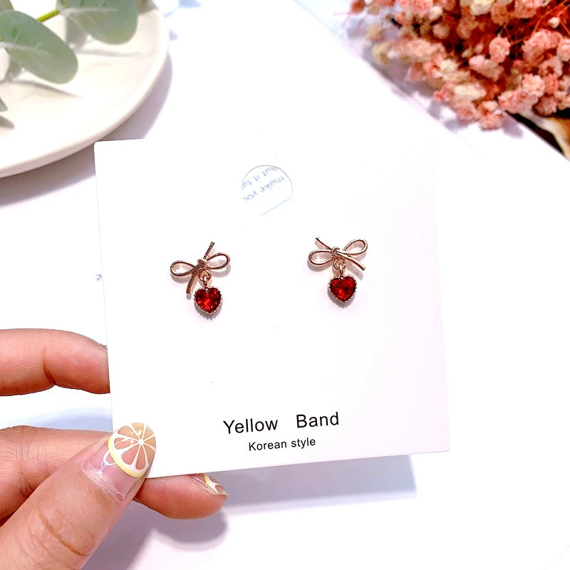 Stud earrings female 925 silver pin tide Korea simple small high-end love bow bow earrings net red lady earrings