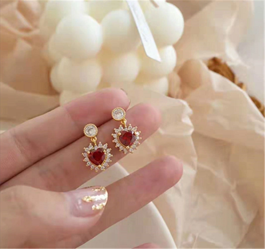 Red gem heart design earrings