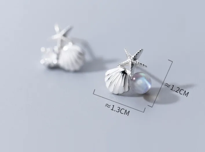 A starfish shell studded with diamond earrings