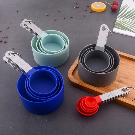 Measuring cup with stainless steel handle