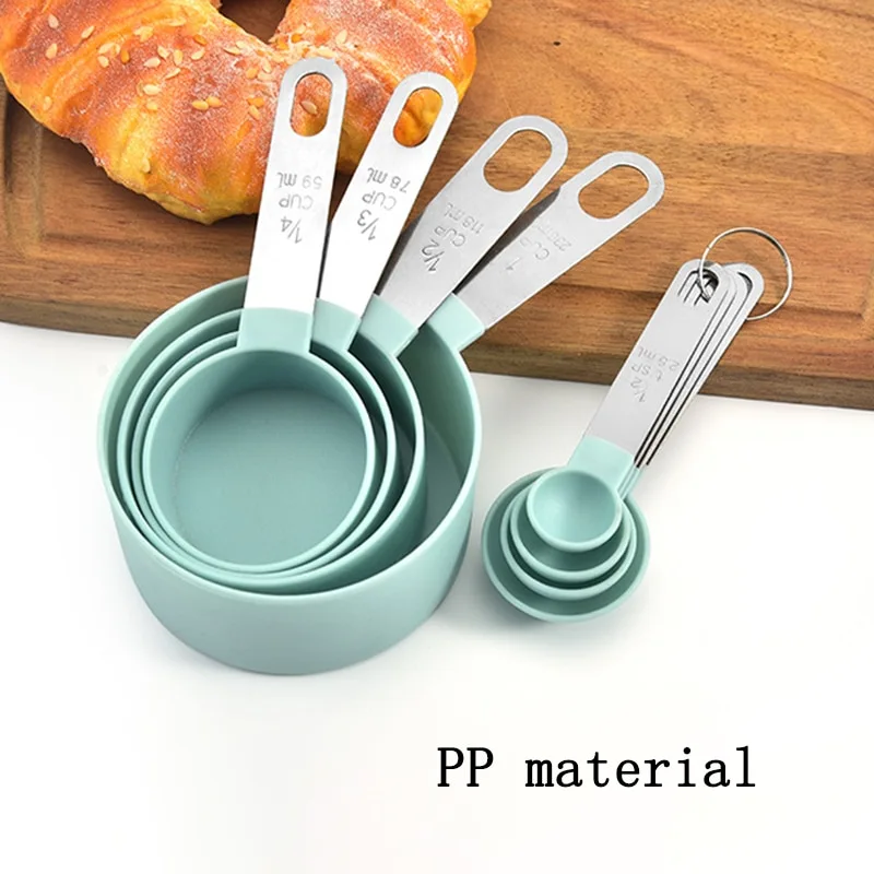 Measuring cup with stainless steel handle