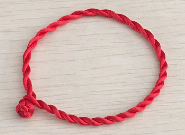 Red rope bracelet in the year of the birth