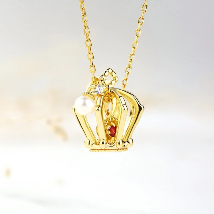 Gold crown pendant