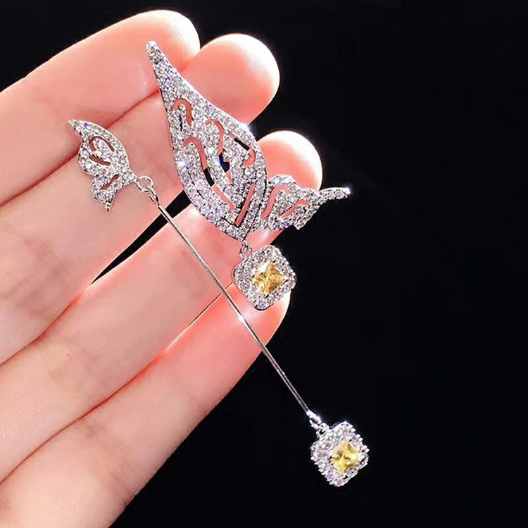 Asymmetrical wing earrings
