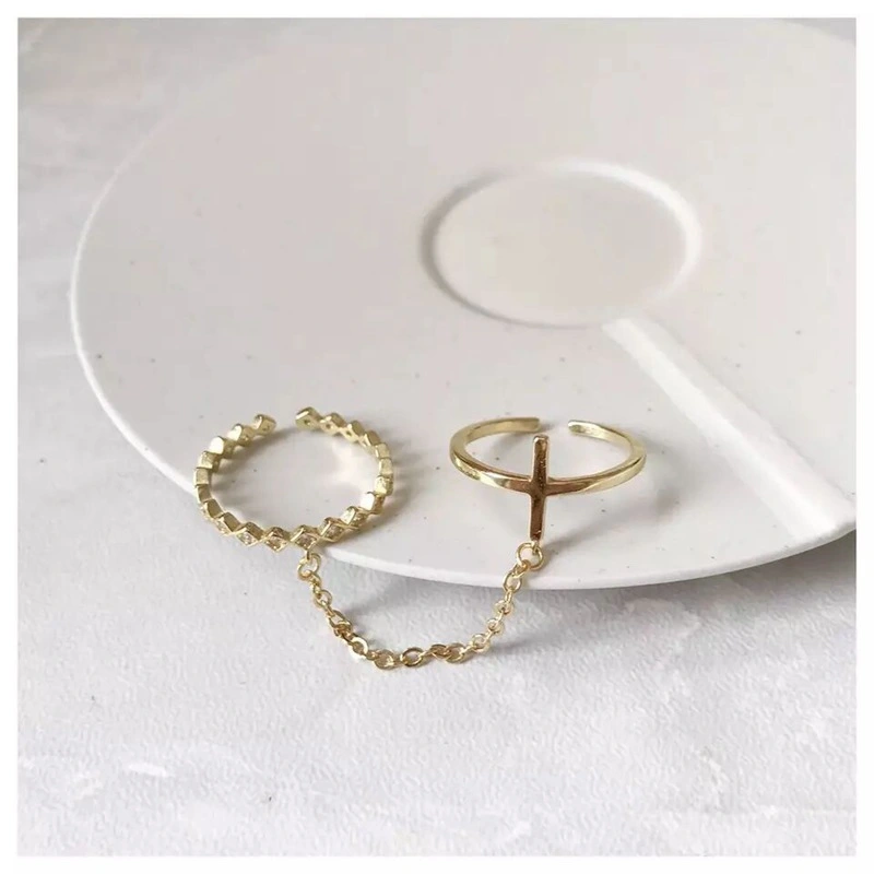 Cross chain ring