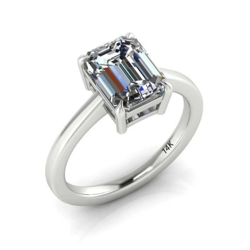 Moissanite four-claw shaped emerald engagement ring