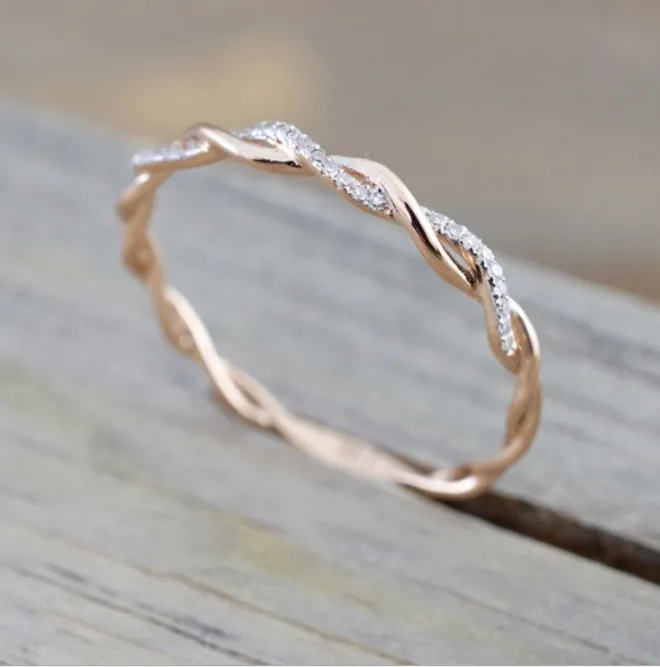 Popular diamond-studded cross twist ring