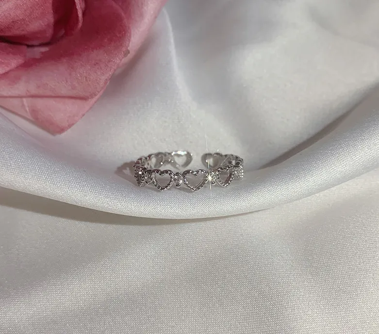 Silver light luxury hollow love index finger ring