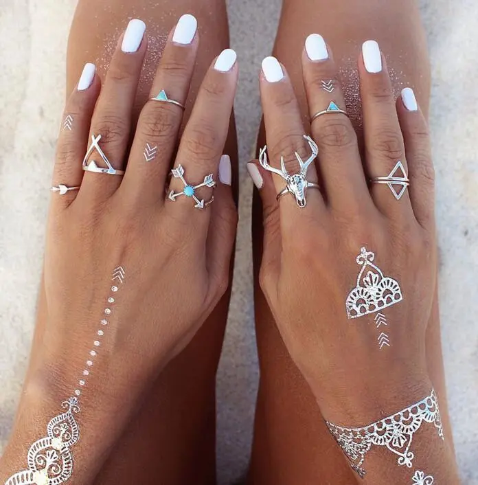 Europe and America Bohemian Gypsies Elk Head Triangle Turquoise Oil Drop Arrow Joint Ring Seven-piece Set