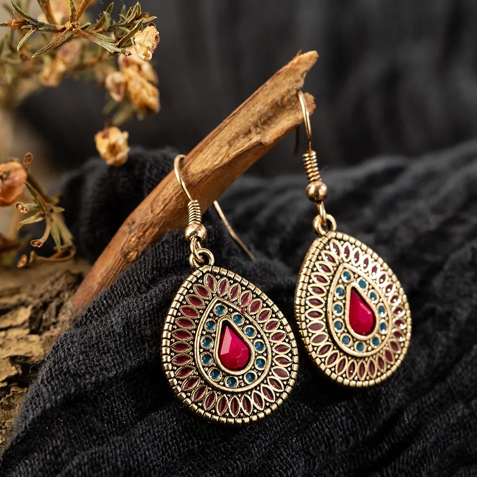 Drop-shaped alloy earrings with gemstones