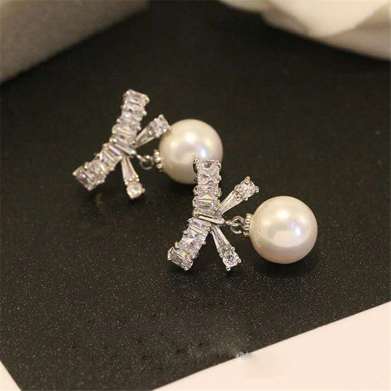 Bow pearl earrings