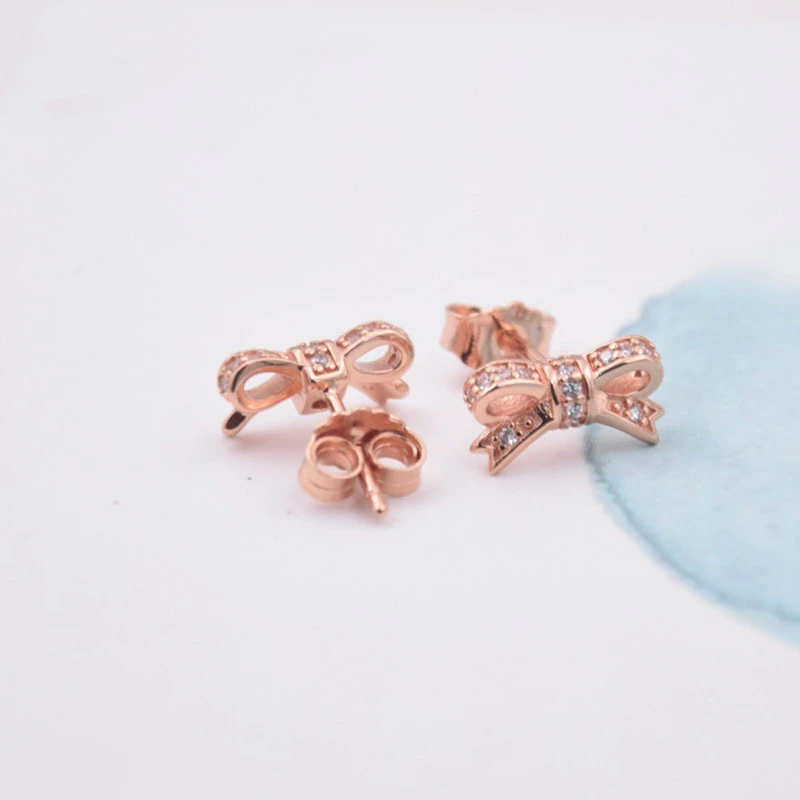 Rose gold bow stud earrings