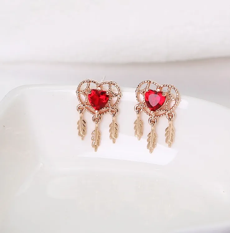 925 silver needle ear nails female temperament Korean personality simple wild zirconia peach heart earrings love girl heart earringsMaterial: Alloy / Silver Plated / Gold Plated Pattern: Love / Water Drop / Bell Style: Japan and South Korea