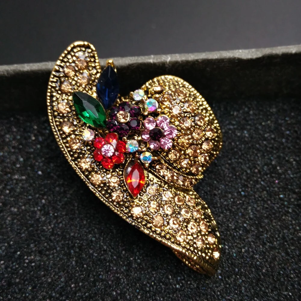 Antique gold brooch with diamond sun hat