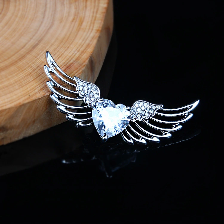 Angel wings brooch