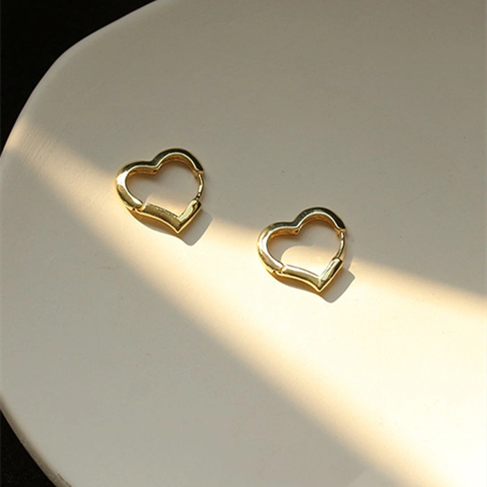 Brass earrings with real gold texture