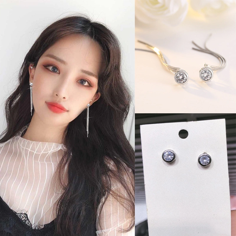 Single diamond tassel earring