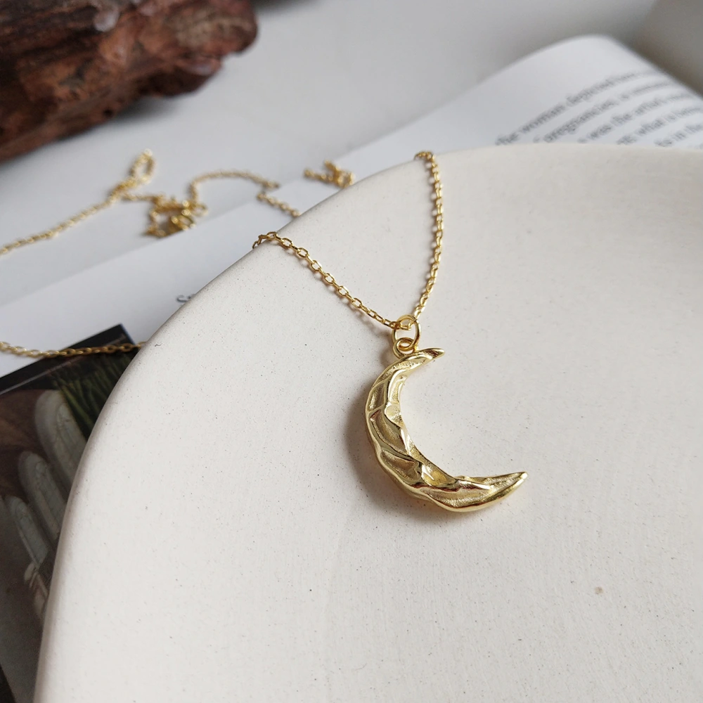 Pleated rippled moon necklace