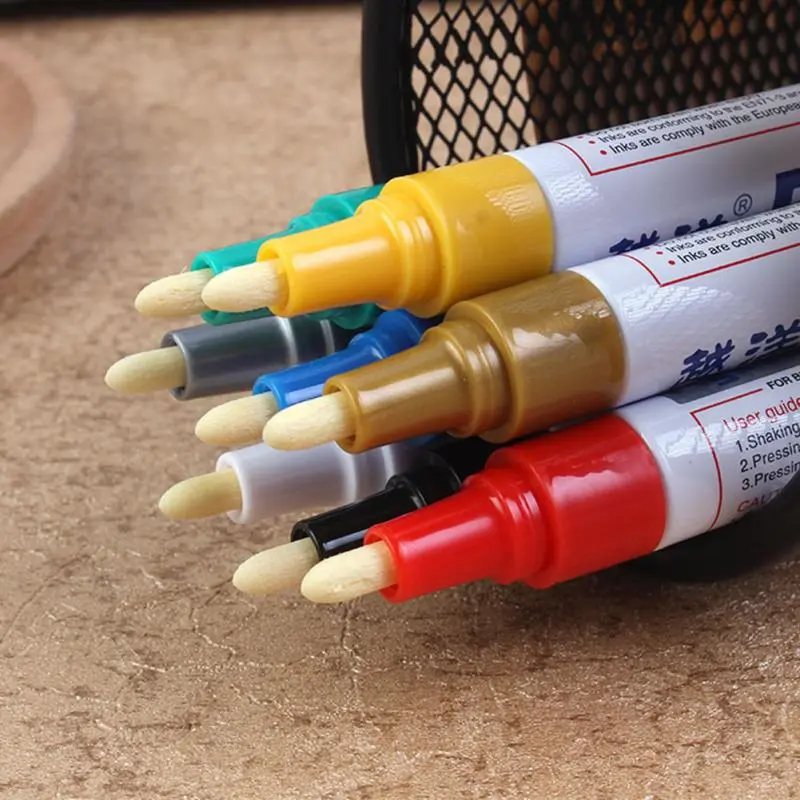 Valve type paint pen tire depicting graffiti pen