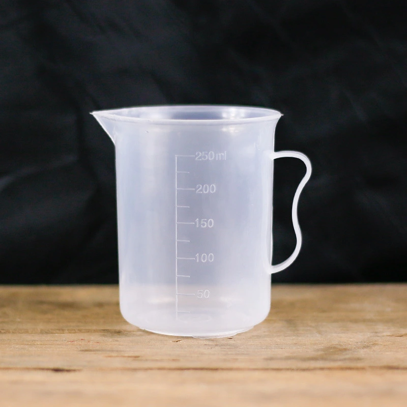 Plastic measuring cup with scale