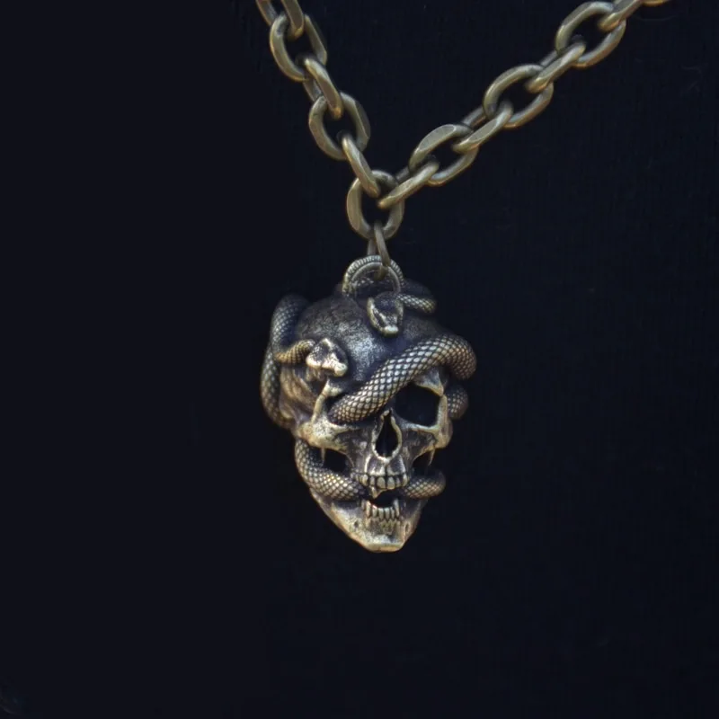Stainless steel snake head skull pendant