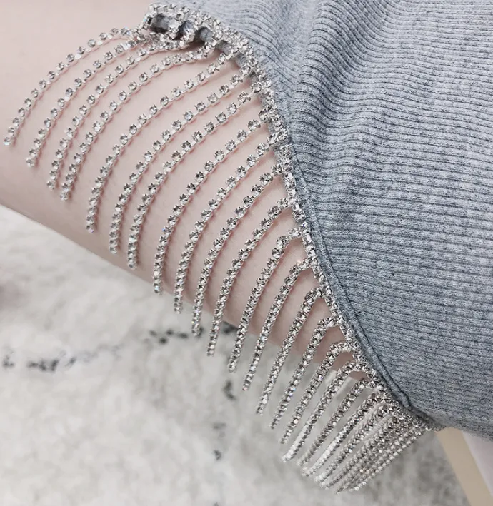 Spring new sexy word shoulder irregular heavy work chain tassel waist slim dress female