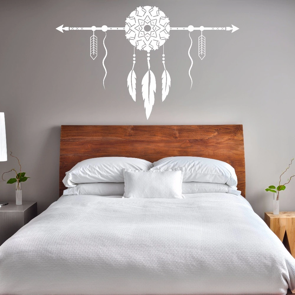 Dream catcher arrowhead wall stickers adorn the girls' room